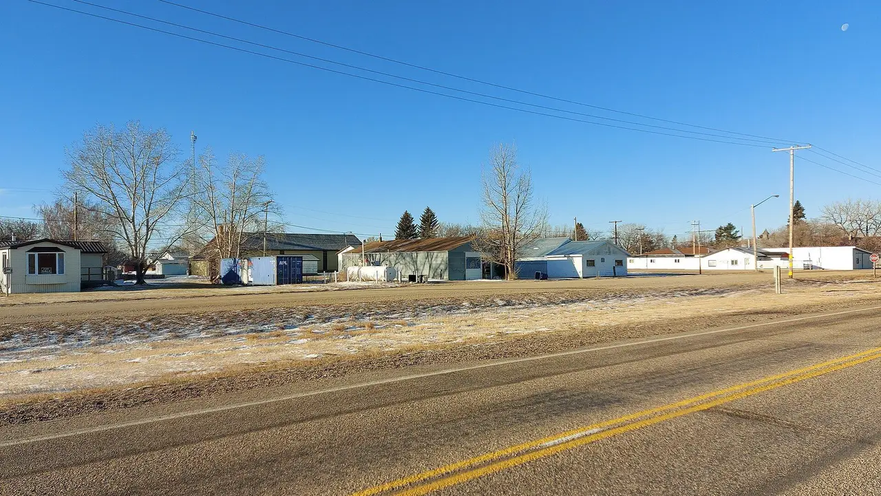 Roadside view of buildings in the village, 2021