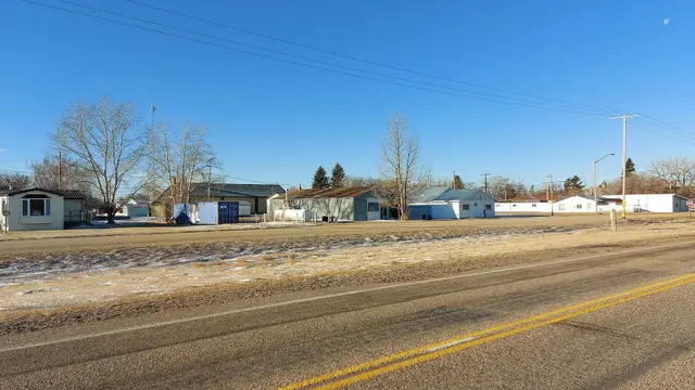 Roadside view of buildings in the village